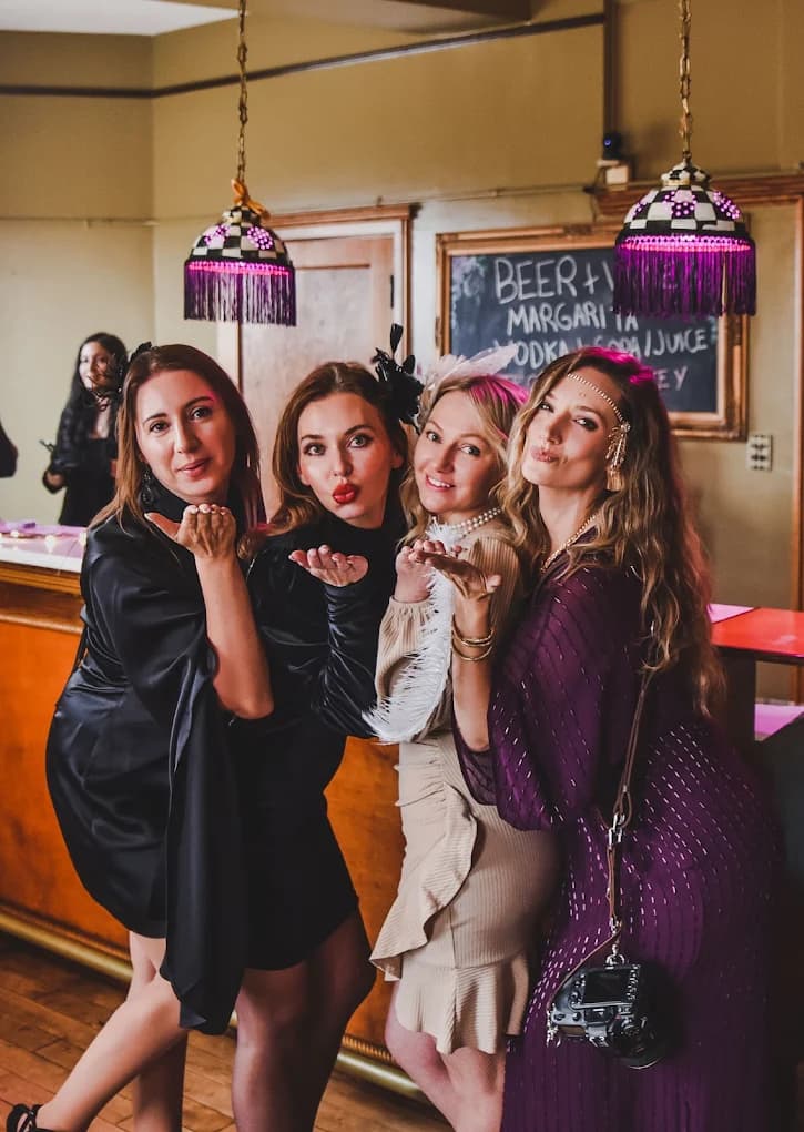 Group celebrating at the bar at Nineteen 25 Denver Private Event Venue